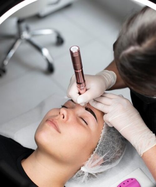 young-woman-going-through-microblading-treatment_23-2149102666